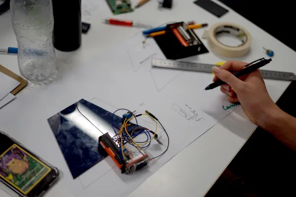 Jude designing the personal device case